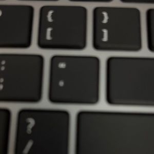 Sleek Black and Silver Laptop Keyboard